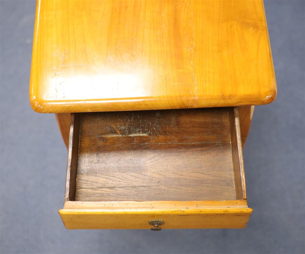 A 19th century Biedermeier cherrywood side table, fitted with a single drawer, raised on cabriole legs